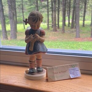 Hummel  “stitch in time” Girl Figurine in Red and Blue